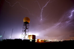 Lightning near a weather radar dome at the National Weather Service in Norman, Oklahoma, USA